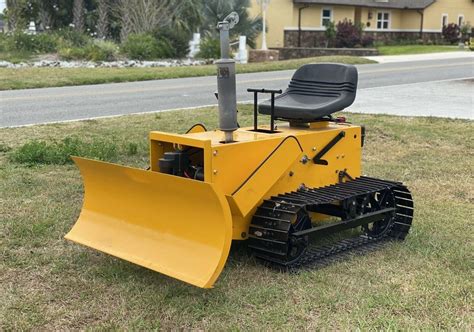 It has an external charger and a runtime of nearly 8 hours. . Struck mini dozer for sale